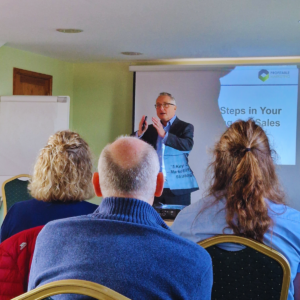 Chris presenting in front of an audience