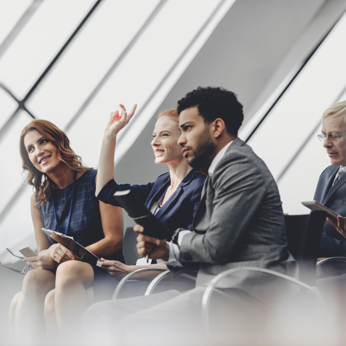Corporate team listening in a meeting